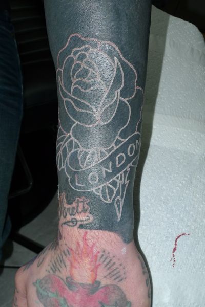 White Rose on Black Tattoo